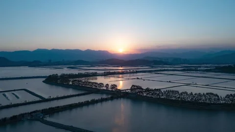Sunset over Paddy - Fish Ponds and Mountains Stock Footage 301593752