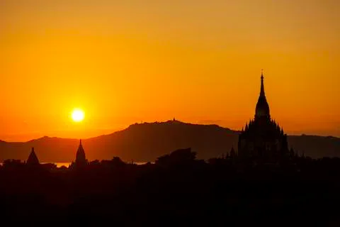 Sunset over pagodas Stock Photos