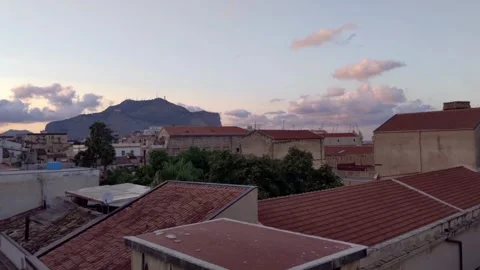 Sunset Over Palermo Sicily Tiled Rooftops and Monte Pellegrino Italy Stock Footage 345148643