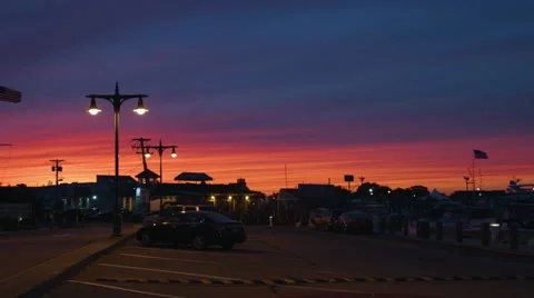 Sunset over a parking lot in long island new york Video stock 64897824