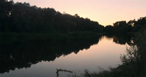 Sunset over the Peaceful Lake Stock Footage 146681802