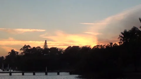 Sunset over Pier &amp; River Stock Footage 62651772