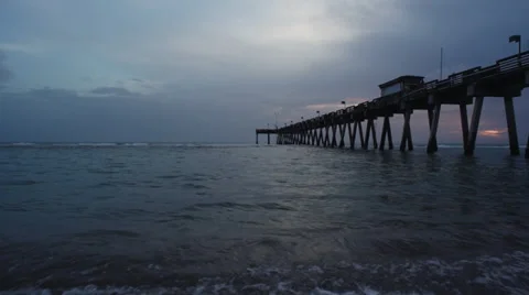 Sunset over Pier on a Sandy Beach Stock Footage 39512767
