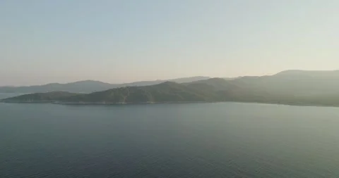 A Sunset Over Platanitsi Wild Beach - Mountains On The Coast Greece Aerial View 库存影片 250104025