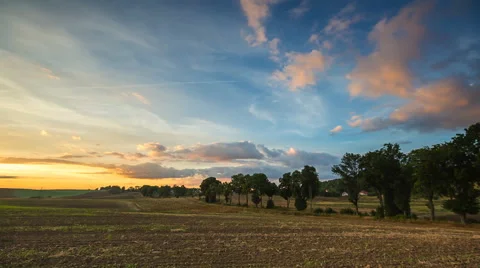 Sunset over plowed field. Stock Footage 58895313