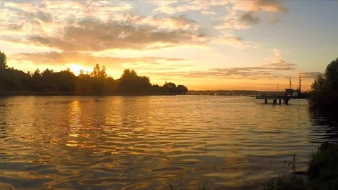 Sunset over the pond and forest in summer 스톡 동영상 82371316