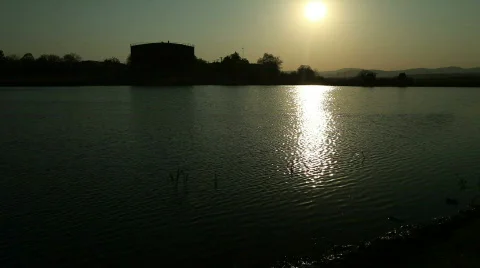 Sunset over Pond Stock Footage 784043