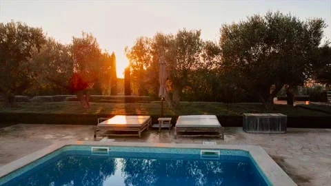 Sunset over the pool Stock Footage 151609896