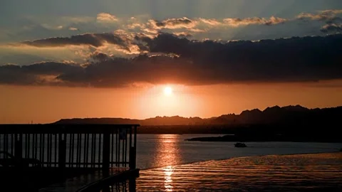 Sunset over the pool overlooking the sea Stock Footage 330236718