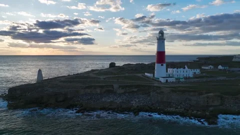 Sunset over Portland Bill Lighthouse, Portland Bill, Isle of Portland, Dorset Video stock 304818816