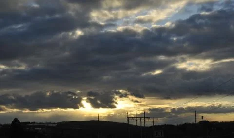 Sunset over power lines Stock Photos