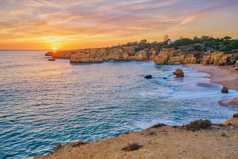 Sunset Over Praia de Sao Rafael Beach in Algarve Stock Photos
