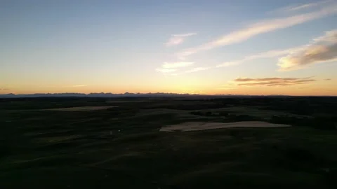 Sunset over the prairies slow aerial pan Stock Footage 219596648