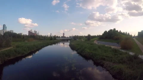 Sunset over Queen Elizabeth Park River Low Altitude Stock Footage 286863069