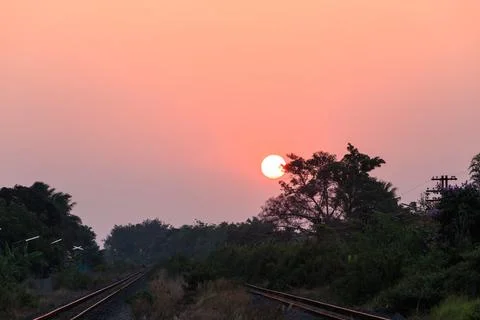 Sunset over railroad Stock Photos