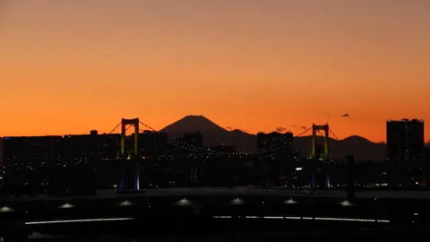 Sunset Over Rainbow Bridge and Mount Fuji in Real Time Stock-Footage 327601607