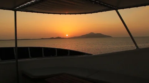 Sunset over Red Sea islands from yacht deck Stock Footage 70103489