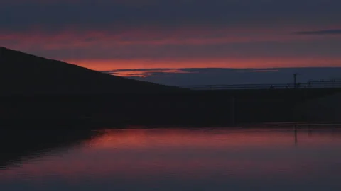 Sunset over reservoir Stock Footage
