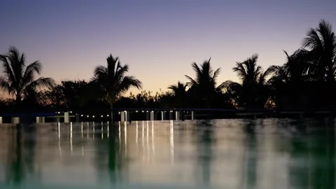 Sunset Over Resort Pool Stock Footage 306016575