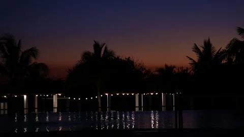 Sunset Over Resort Pool Stock Footage 306016587