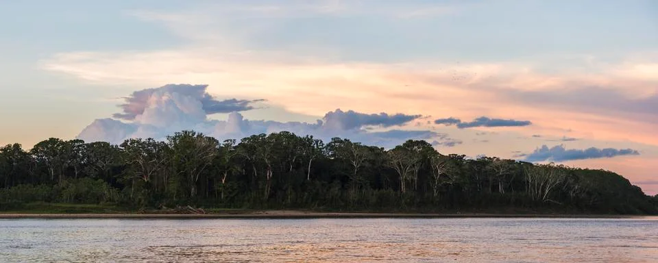 Sunset over river in Amazon Jungle of Peru, Tambopata National Reserve, Peru, Stock Photos