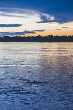 Sunset over river in Amazon Jungle of Peru, Tambopata National Reserve, Peru, Stock Photos