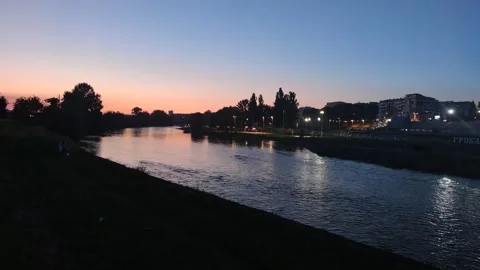 Sunset over the river and city Stock-Footage 247735581