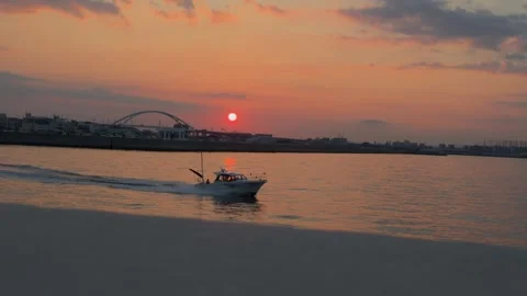 Sunset Over River with Boat Stock Footage 314626637