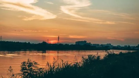 Sunset over the river in the city Stock Photos