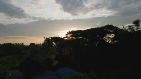 Sunset over the river with clouds and city skyline. 動画素材 290852224