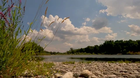 Sunset over the river with clouds on the horizon Stock Footage 201410340