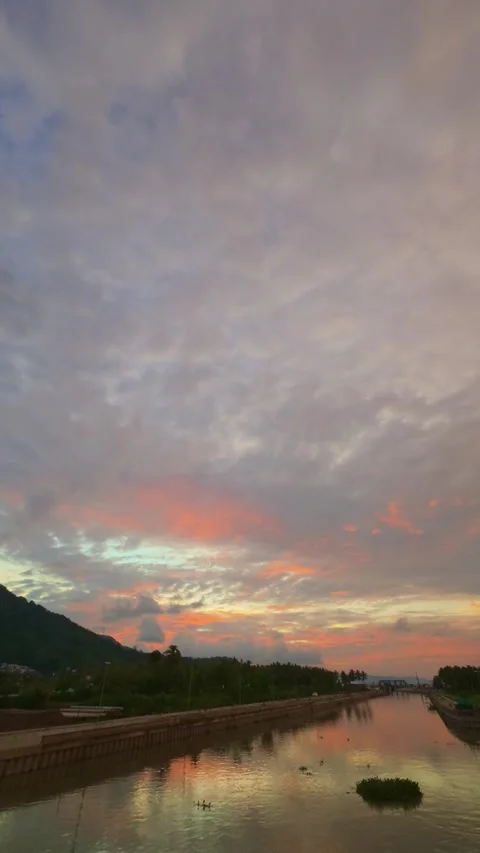 Sunset over the river in the evening Stock Footage 300171634