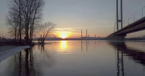 Sunset over the river Stockbeeldmateriaal 73023291