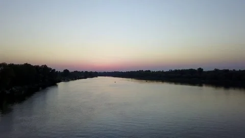 Sunset over the river Stock Footage