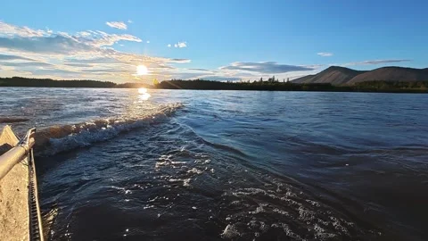 Sunset Over River with Mountains and Reflections Stock Footage 341422493