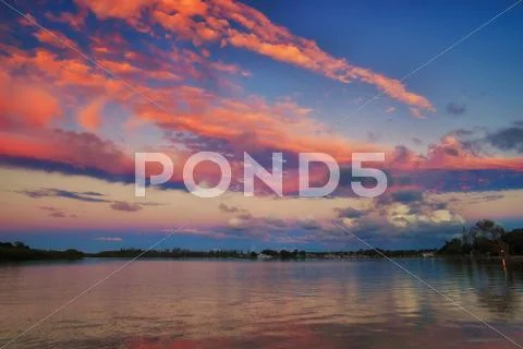 Sunset over the river Stock Photos