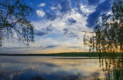 Sunset over the river Stock Photos