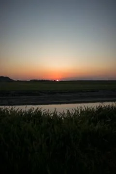 Sunset over the river Foto stock