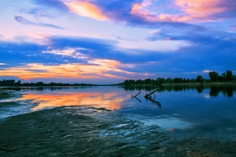 Sunset over the river Stock Photos