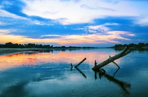 Sunset over the river Stock Photos