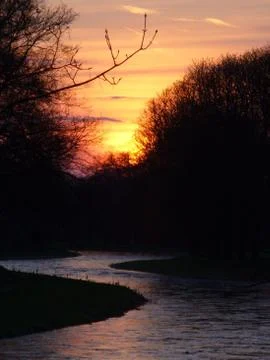 Sunset over river Foto stock