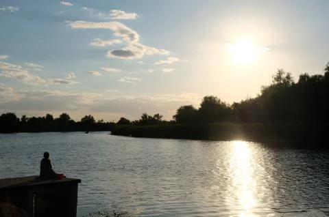 Sunset over the river Stock Photos
