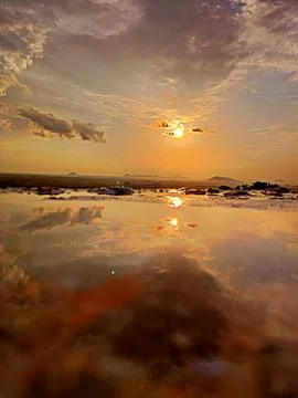 Sunset over the river Stock Photos