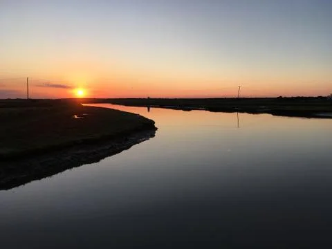 Sunset over river Foto stock