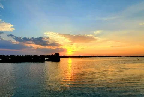 Sunset over the river Stock Photos