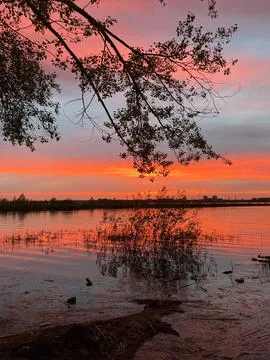 Sunset over the river Stock Photos