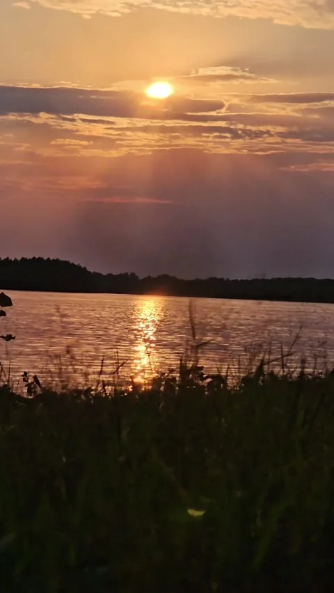 Sunset over the river, the Volga, the sun is setting Stock Footage 312004964