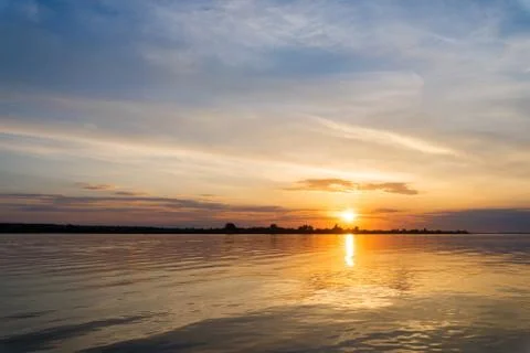 Sunset over river waters Foto stock