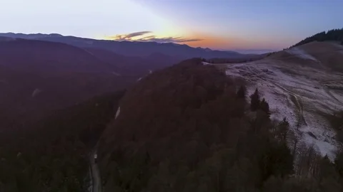 Sunset over road through autumn forest Video stock 69903314
