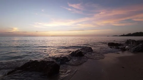 Sunset over Rocky Beach and Calm Sea, Koh Samui, Thailand Stock Footage 340180001